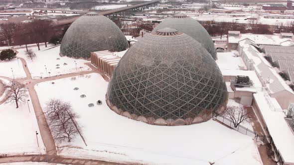 Drone Aerial of Milwaukee Domes at Mitchell Park during winter in Wisconsin