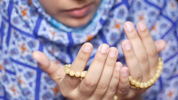 Close Up of Muslim Women Hand Praying at Ramadan