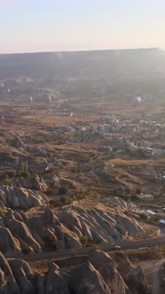 Vertical Video of Hot Air Balloons Flying in the Sky Over Cappadocia Turkey