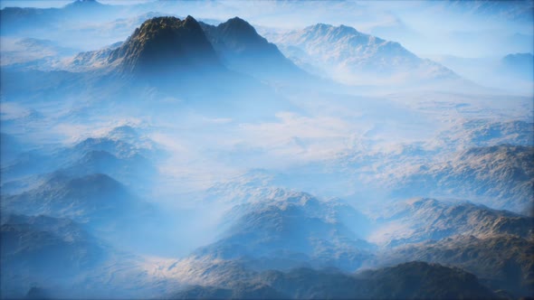 Distant Mountain Range and Thin Layer of Fog on the Valleys