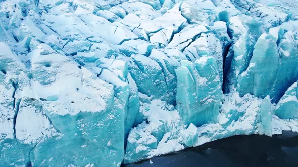 Glacier in Iceland Beautiful Ice From Pure Blue Water Close Up Aerial Top View Winter Landscape in