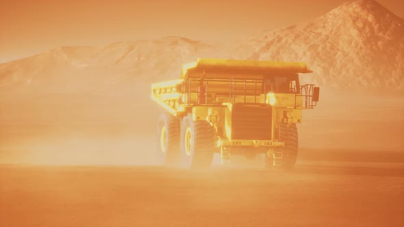 Big Yellow Mining Truck in the Dust at Career