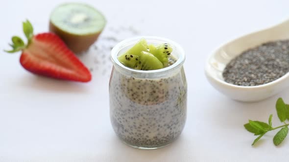 Chia Pudding Decorated With Kiwi and strawberry slices