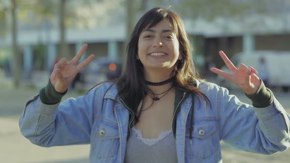 Cheerful Teenage Girl Gesturing Outdoor