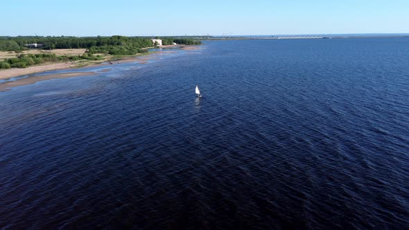 Flying Over a Boat with a Sail