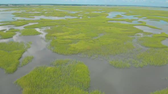 drone shots of the sand dunes and marsh lands at the coast