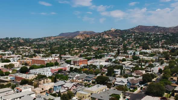 Landscape view of Los Angeles from Los Feliz neighbourhood with Hollywood Hills, Griffith Observator