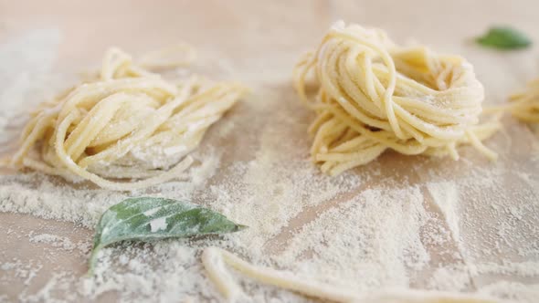 Home Made Pasta on the Table with Flour