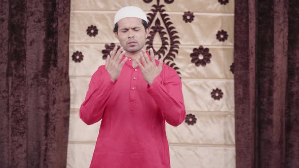 Muslim man reading Namaz