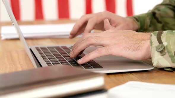 Soldier using laptop