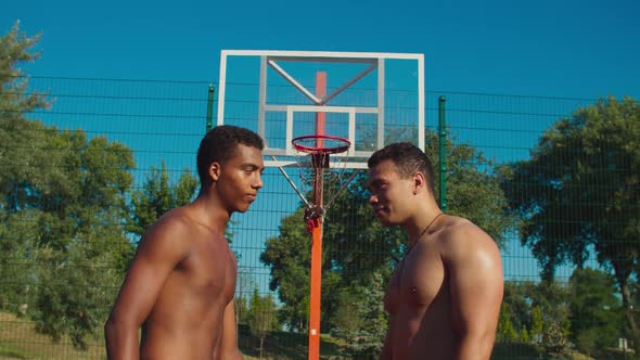 Athletes Looking at Each Other on Basketball Court