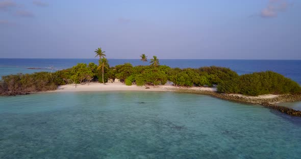 Natural overhead clean view of a sunshine white sandy paradise beach and turquoise sea background in