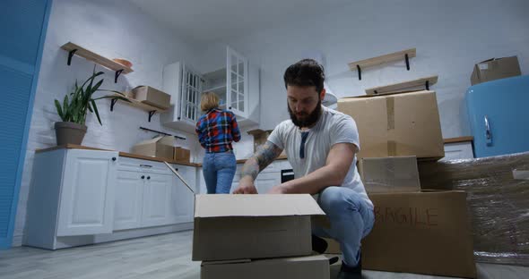 Young Couple Moving in Their New Home