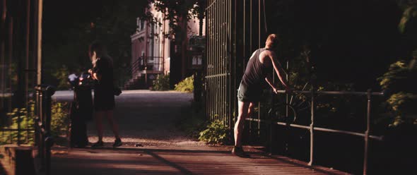 Man warms up by swinging leg