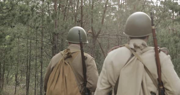 Reenactors Dressed As Russian Soviet Infantry Red Army Soldiers Of World War II Marching Walking