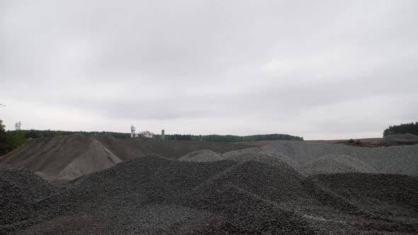 a Mobile Asphalt Plant Next to a Road Under Construction