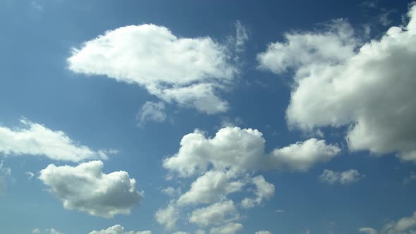 White Clean Cumulus Clouds Moving In The Sky
