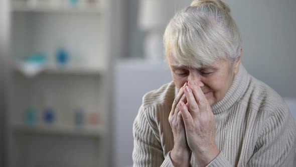 Upset Elderly Female Patient Crying in Hospice, Incurable Disease, Depression