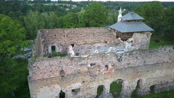 Medieval Castle Ruins in Latvia Rauna. Aerial View Over Old Stoune Brick Wall of Raunas Castle 
