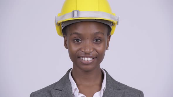 Face of Young Happy African Businesswoman Wearing Hardhat