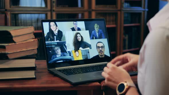 Students Listening To Instructor Smiling Sharing Ideas During Online Lecture