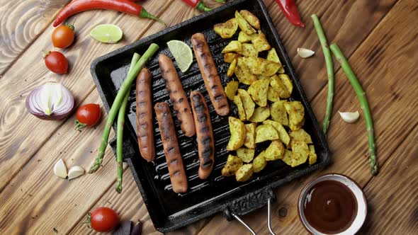 Baked Potatoes and Grilled Soy Sausages on Dark Wooden Background