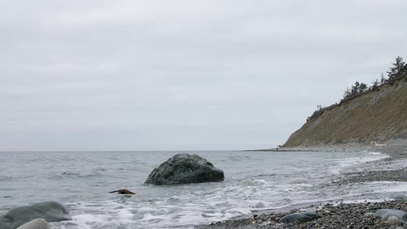 Waves from the Puget Sound lapping up onto the shore at Ebey's Landing.