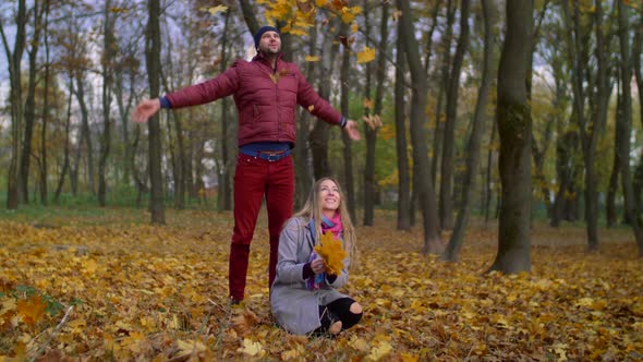 Carefree Joyful Couple Relaxing in Autumn Park