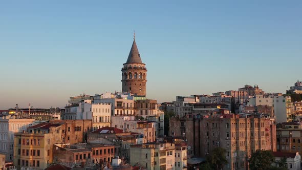 Footage of bosphorus in the sunset having galata tower in the middle