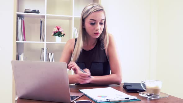 Blonde Business Woman Working at Modern Office