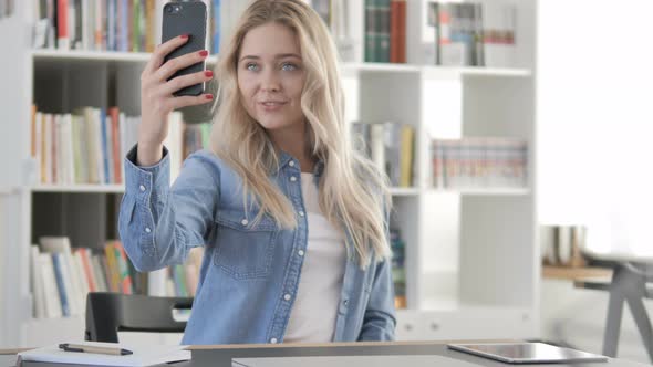 Woman Taking Selfie with Smartphone