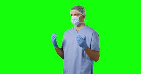 Young surgeon in scrubs