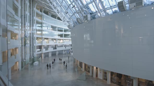 Businesspeople in Lobby of Modern Business Center