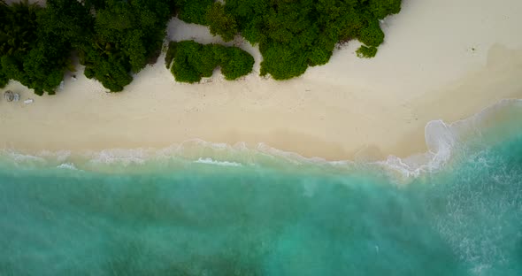 Tropical drone abstract view of a white sandy paradise beach and aqua blue ocean background