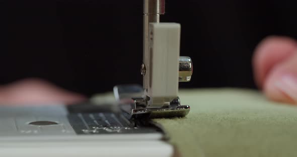 Dressmaker Working on Sewing Machine Closeup