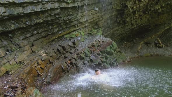 The Boy Bathes in a Dark Lake