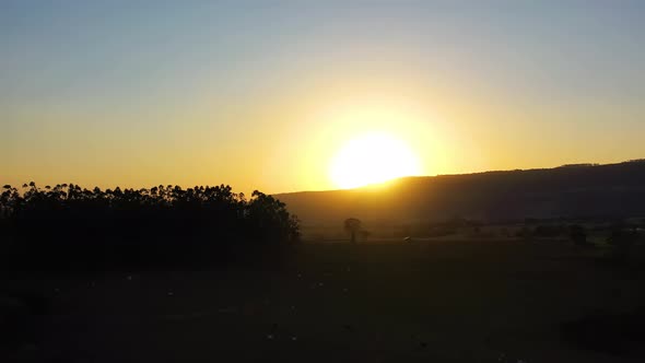 Sunset at farming landscape at countryside rural scenery.