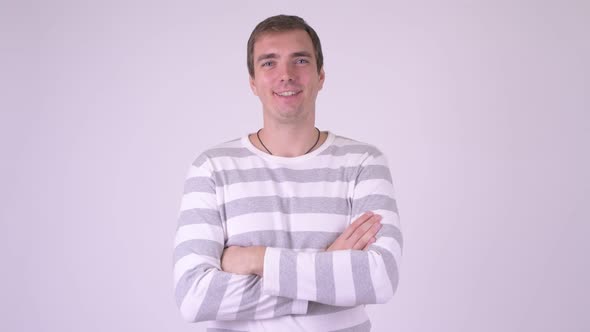 Young Happy Man Doing Various Gestures While Smiling