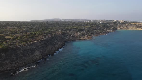 Nice view of the cliffs by the sea. View of the sea surf near the rocks on the sea. Cyprus.