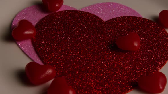 Rotating stock footage shot of Valentines decorations and candies - VALENTINES 0112
