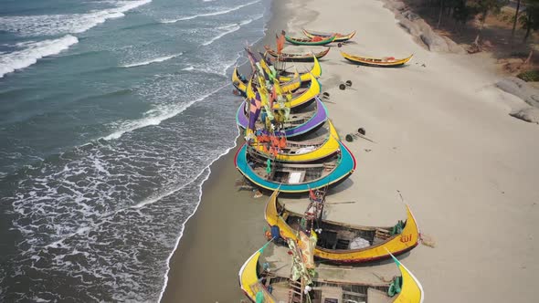 Aerial view of traditional fishing boats in Chittagong, Bangladesh.