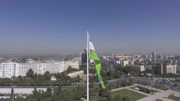 flag of uzbekistan on the "friendship of peoples" square