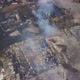 Aerial View Over Smouldering Ruins in Smoke, Firefighters Are Extinguishing Fire - VideoHive Item for Sale