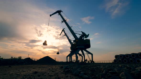 Loading Machines Work at Docks, Moving Breakstones