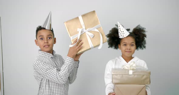 Black Kids Celebrating Birthday Over White Background