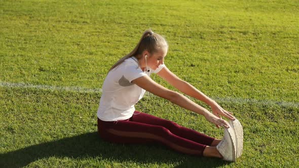 Woman Stretches the Body