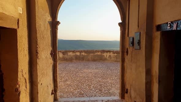 First-person walk at belvedere of Porta Novella at sunset. Penna in Teverina, Italy