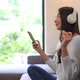 Woman use smart phone for listen music - VideoHive Item for Sale