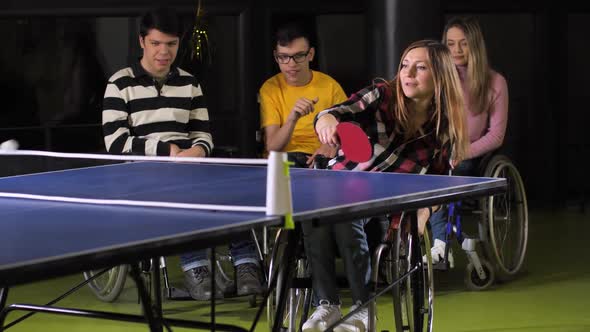 Happy Woman Dancing on Wheelchair Winning Game