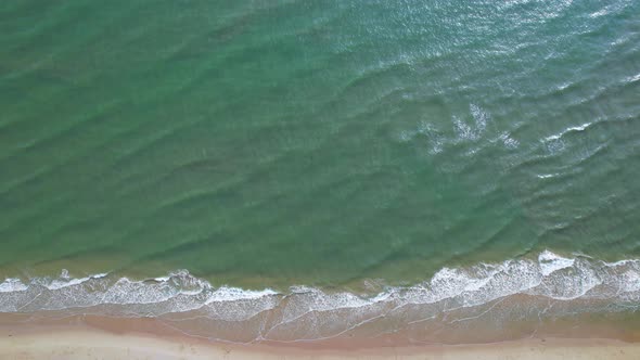 4K Aerial view top view drone move Beautiful topical beach with white sand. Cinematic drone shot.